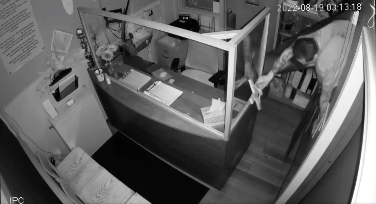 A Catholic school in Los Angeles County was robbed of nearly $5,000 by a man caught on security video using a crucifix to break in and steal the money in Bell Gardens, Calif., on Aug. 19, 2022. (Screenshot via Twitter/Bell Gardens Police)