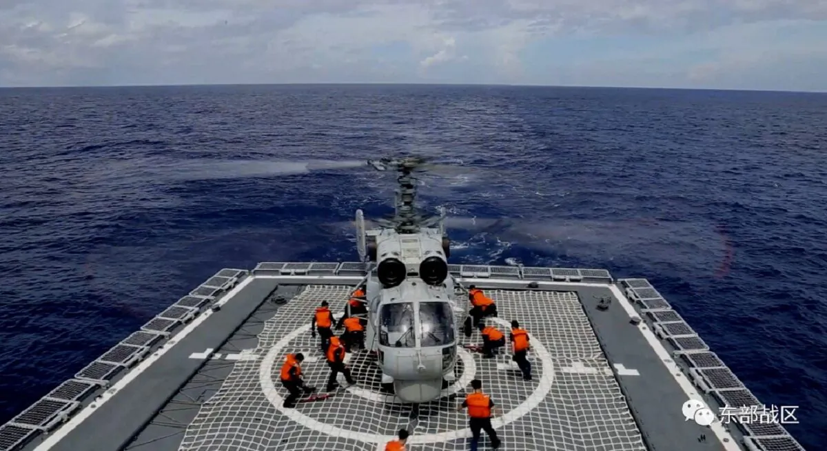 A Navy Force helicopter under the Eastern Theatre Command of the Chinese army takes part in military exercises in the waters around Taiwan, at an undisclosed location, on Aug. 8, 2022. (Eastern Theatre Command/Handout via Reuters)