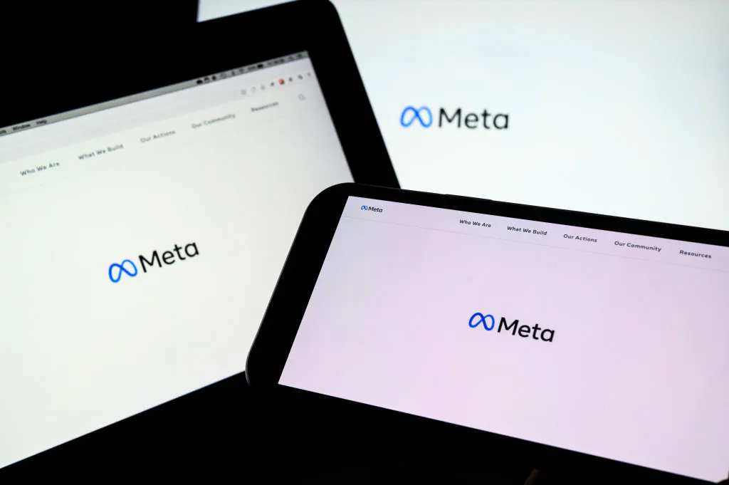 Three screens display the splash page for the Meta page on the Facebook website in London, England, on Oct. 29, 2021. (Leon Neal/Getty Images)