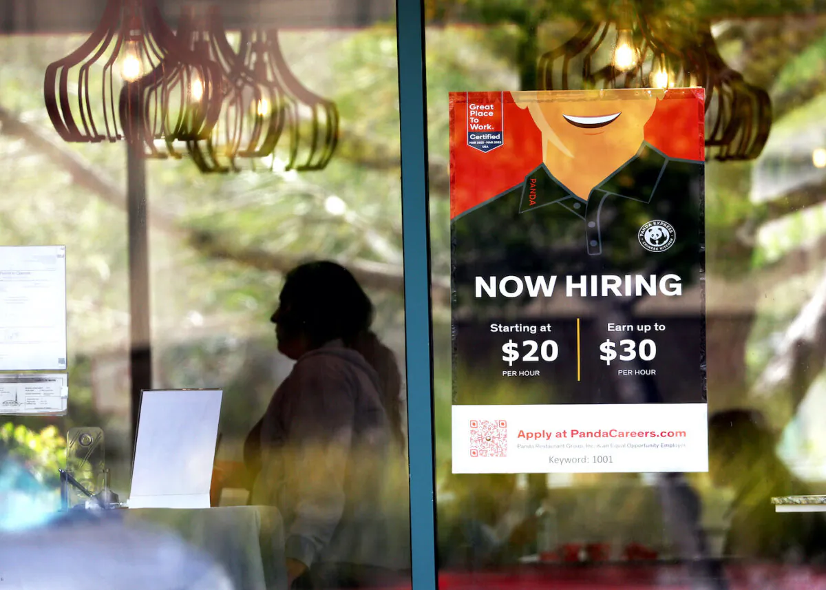 A "now hiring" sign is posted at a Panda Express restaurant in Marin County, Calif., on Aug. 5, 2022. (Photo by Justin Sullivan/Getty Images)