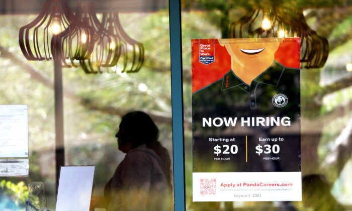 A "now hiring" sign is posted at a Panda Express restaurant in Marin City, Calif., on Aug. 5, 2022.  (Justin Sullivan/Getty Images)
