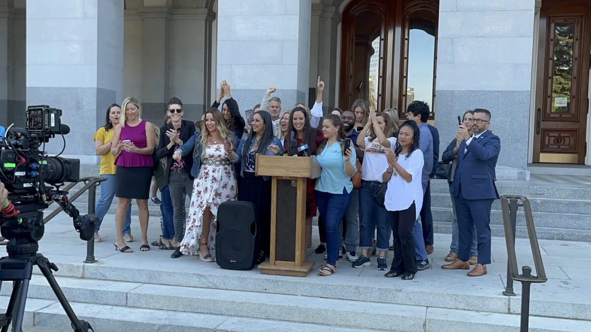 Parental rights advocates celebrate the withdrawal of a California bill that would have allowed children 15 years old or up to get vaccines without parental consent in Sacramento on Aug. 31, 2022. (Courtesy of Protection of the Educational Rights of Kids)