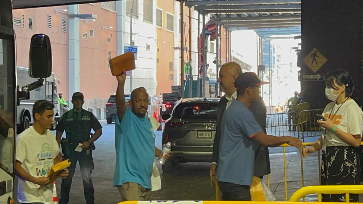 Undocumented aliens bused from Texas to New York City arrive at Port Authority on Aug. 27, 2022. (Madalina Vasiliu/The Epoch Times)