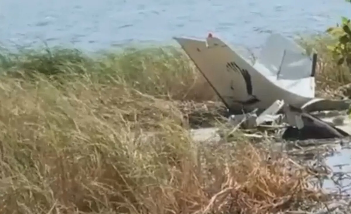 Debris of a plane after it crashed in the Zambezi region, Namibia, on Aug. 30, 2022, in a still from video. (Namibia Broadcasting Corporation via AP/Screenshot via The Epoch Times)