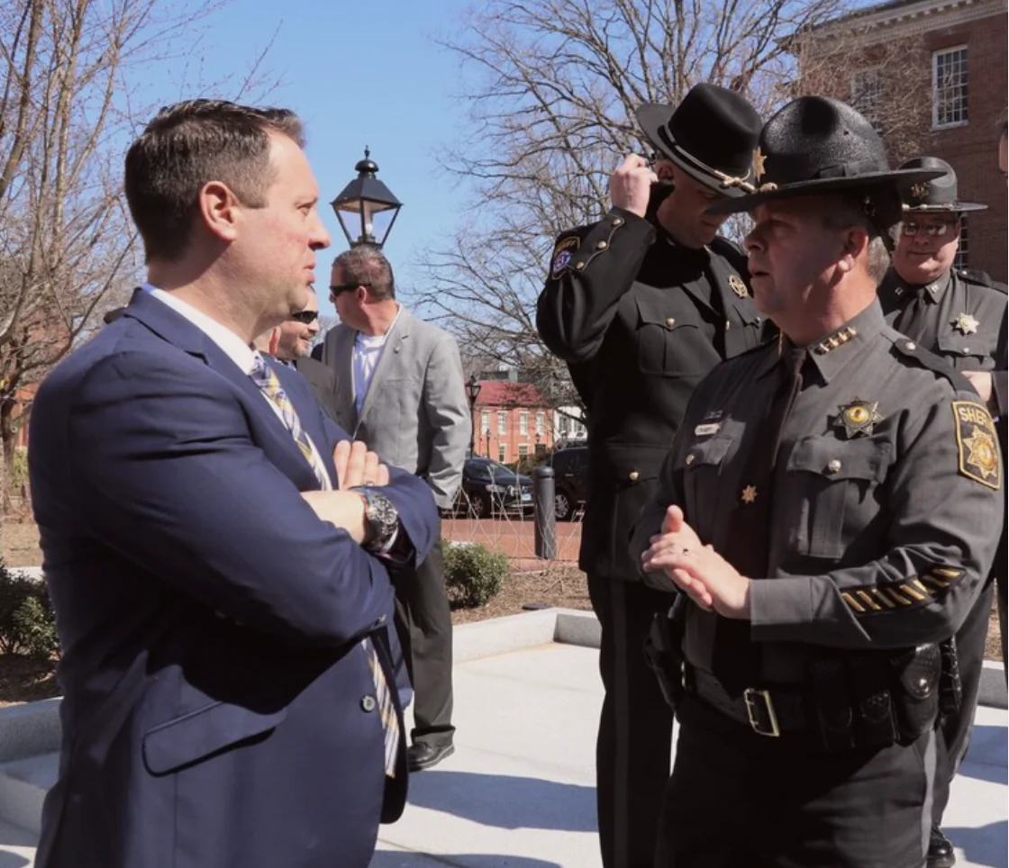 Maryland Republican governor candidate state Del. Dan Cox (R-Frederick) speaks with county sheriffs as part of his underdog campaign against Democrat Wesley Moore in their Nov. 8 election. (Courtesy of Dan Cox for Governor)