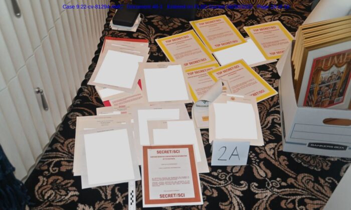 Documents seized during the Aug. 8 raid by the FBI of former President Donald Trump's Mar-a-Lago estate in Palm Beach, Fla, in a photo released on Aug. 30, 2022. (FBI via The Epoch Times)
