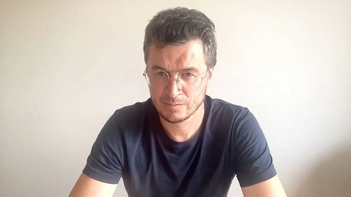 Mattias Desmet, professor of clinical psychology at Ghent University in Belgium and a leading expert on mass formation, is seen during an interview for EpochTV’s “Crossroads” program on Aug. 18, 2022. (Screenshot/The Epoch Times)