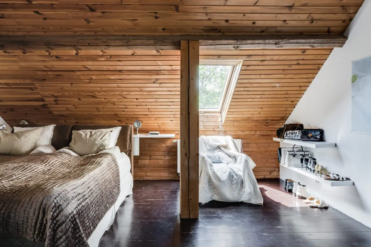 Upstairs, simple sleeping quarters give off a practical yet comfortable ambiance, as the home is all about comfort, not show. (Courtesy of Sweden Sotheby’s International Realty)