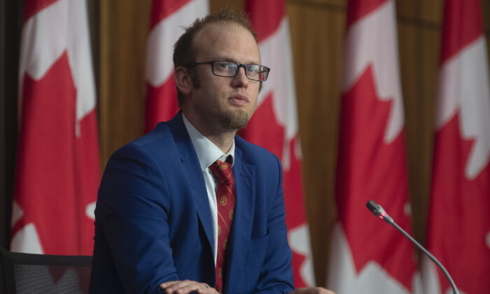 Conservative MP Arnold Viersen listens to a speaker during a news conference,  on May 27, 2021 in Ottawa. (The Canadian Press/Adrian Wyld)