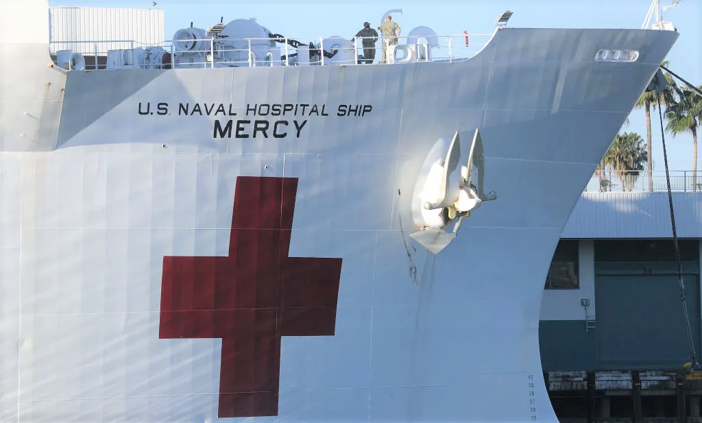 Military personnel stand aboard the USNS Mercy Navy hospital ship docked in the Port of Los Angeles in San Pedro, Calif., on April 15, 2020. (Mario Tama/Getty Images)