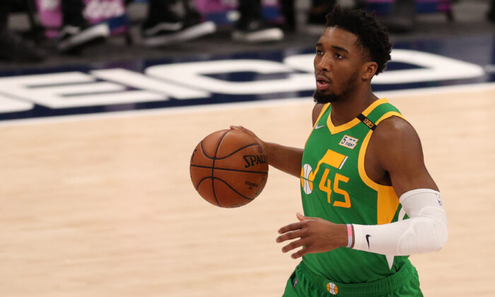 Donovan Mitchell (45) of the Utah Jazz dribbles the ball against the Washington Wizards during the first half at Capital One Arena in Washington, DC, Mar. 18, 2021 (Patrick Smith/Getty Images)