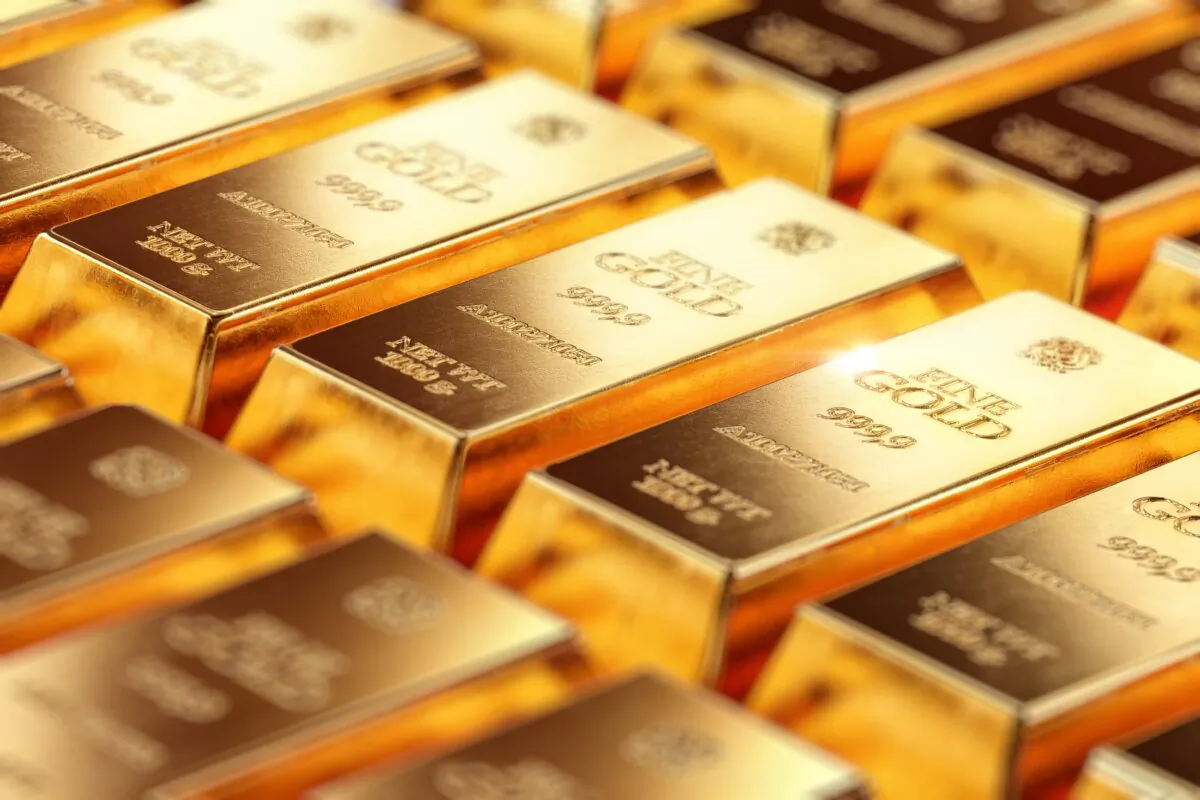 Gold bullion bars in bank vault storage. (Corona Borealis Studio/Shutterstock)