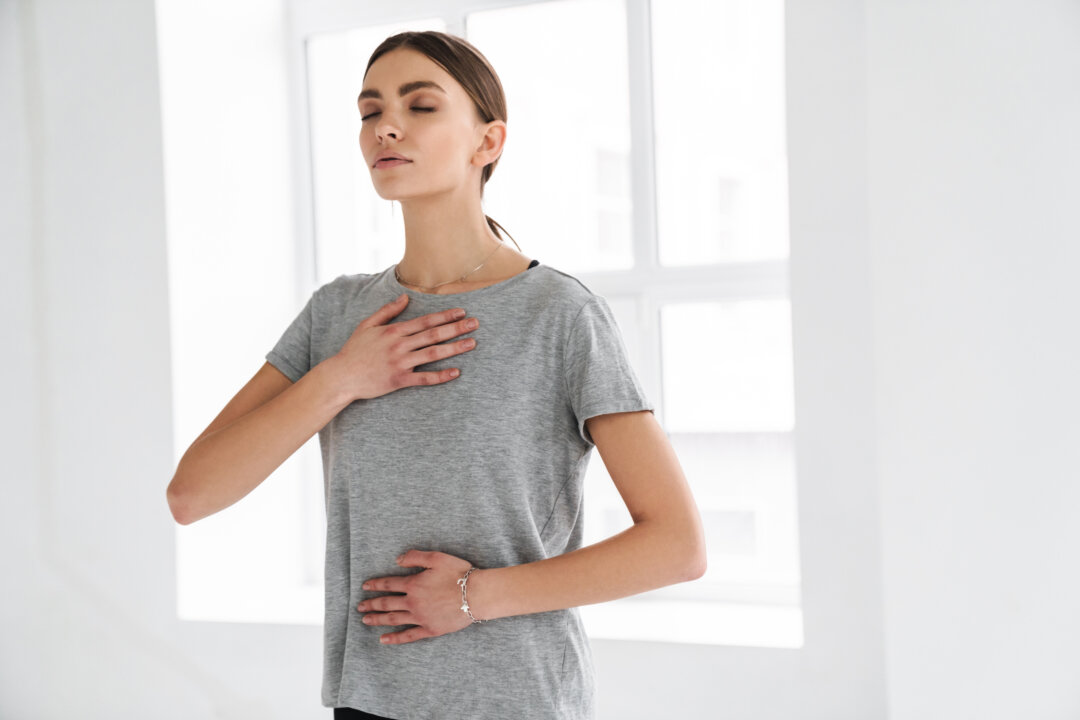 Spending just a few minutes practicing deep breathing can greatly reduce anxiety levels. (Dean Drobot/Shutterstock)