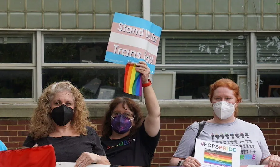 FCPS Pride rally to support Fairfax County Public Schools' (FCPS) pro-transgender policy outside of the Luther Jackson Middle School in Falls Church, Va., on June 16, 2022. (Terri Wu/The Epoch Times)
