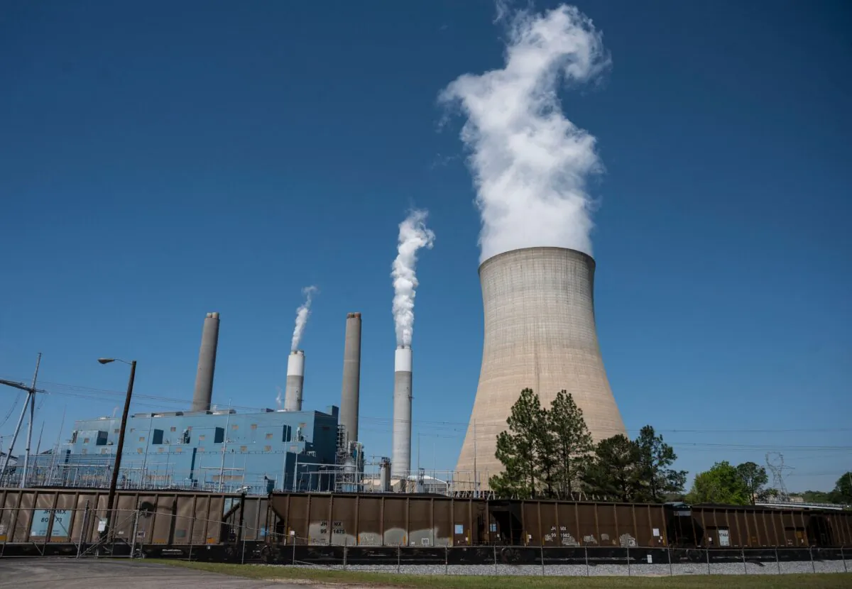 Steam rises from the Miller coal Power Plant in Adamsville, Ala., on April 13, 2021. (Andrew Caballero-Reynolds/AFP via Getty Images)