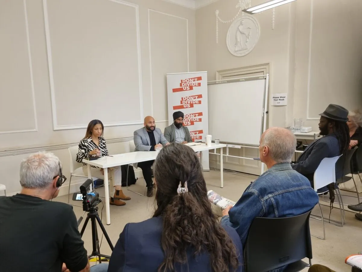 Speakers (L to R) Khadija Khan, Rakib Ehsan, and Hardeep Singh at a Don't Divide Us event in London on Sep. 1, 2022 (Chris Summers/The Epoch Times)