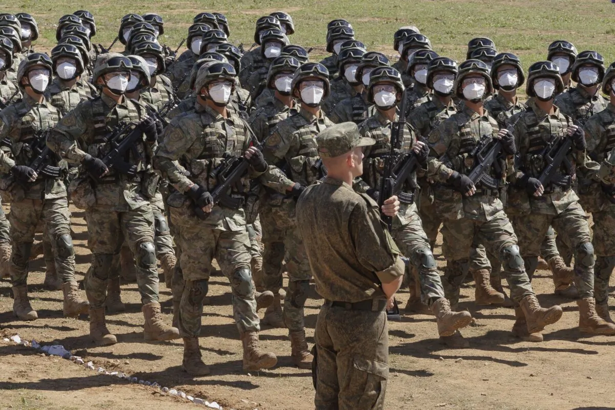 Chinese troops march during the Vostok 2022 military exercise at a firing range in Russia's Far East, on Aug. 31, 2022. (Vadim Savitsky/Russian Defense Ministry Press Service via AP)