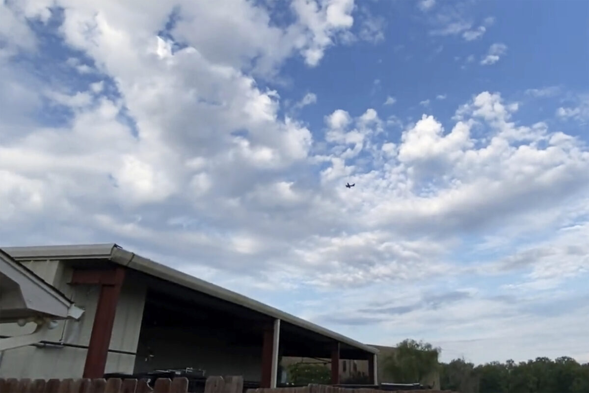 A small airplane circles over Tupelo