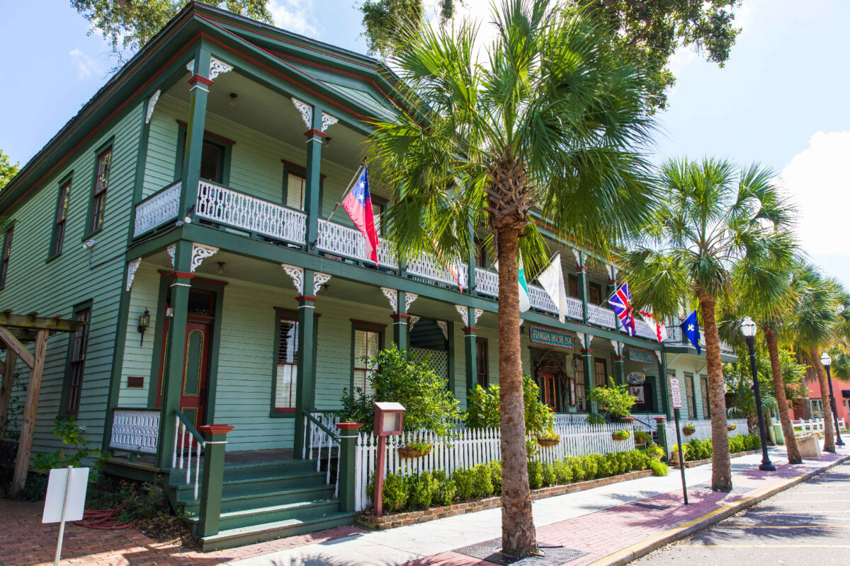 The Florida House Inn flies the flags of all the entities that have influenced Amelia Island. (Photo courtesy of Amelia Island.) 