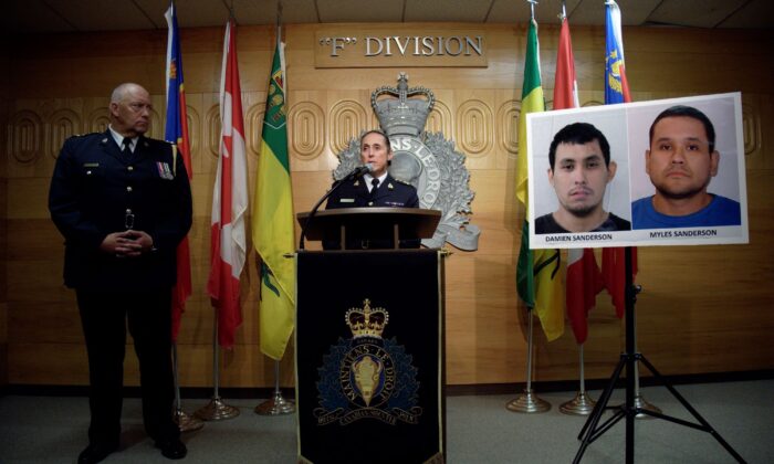 RCMP Assistant Commissioner Rhonda Blackmore (R) speaks while Regina Police Chief Evan Bray looks on during a press conference at RCMP F Division Headquarters in Regina on Sept. 4, 2022. (The Canadian Press/Michael Bell)