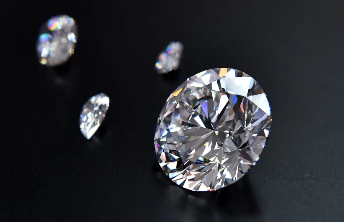 A view of the main 51.38-carat round-cut diamond, the Dynasty, among other gems from Russian diamond miner Alrosas Dynasty polished diamonds collection in Moscow on Aug. 3, 2017. ( Yuri Kadobnov/AFP via Getty Images) 