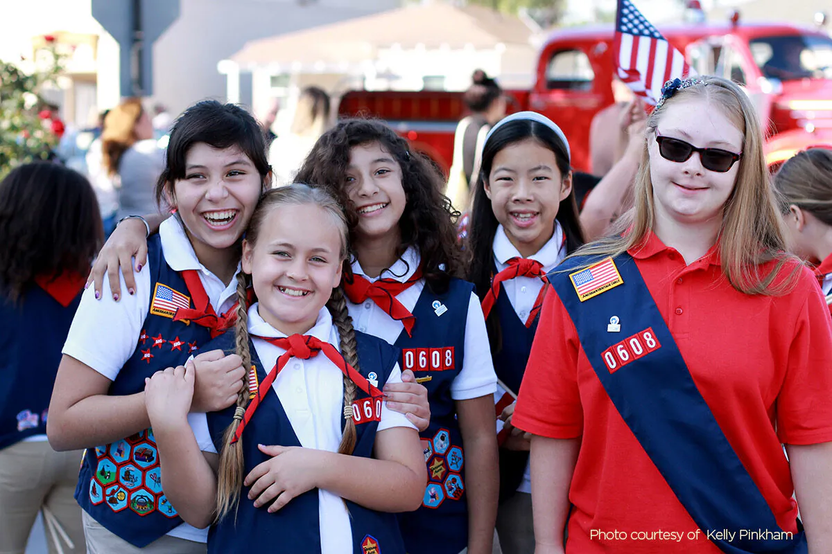 Members of the American Heritage Girls celebrate the joys of girlhood at a recent troop event. The organization is one of many faith-based youth programs benefitting from the loss of membership in the iconic Girls Scout of the USA. (Courtesy of American Heritage Girls)