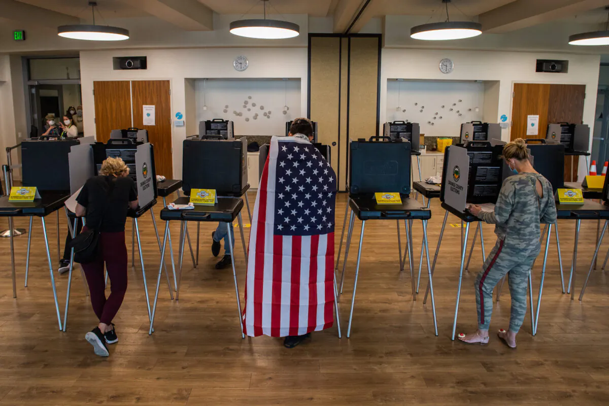 David Boston Angel (c) marks his ballot at Marina Park Community Vote Center in Newport Beach, Calif., on Nov. 3, 2020. (Apu Gomes/Getty Images)