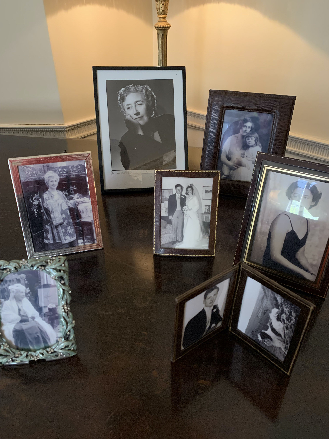 Family heirlooms, with a portrait of Agatha Christie in the background, adorn Greenway, the author's home on England's south coast.  (Photo courtesy of Carl H. Larsen)