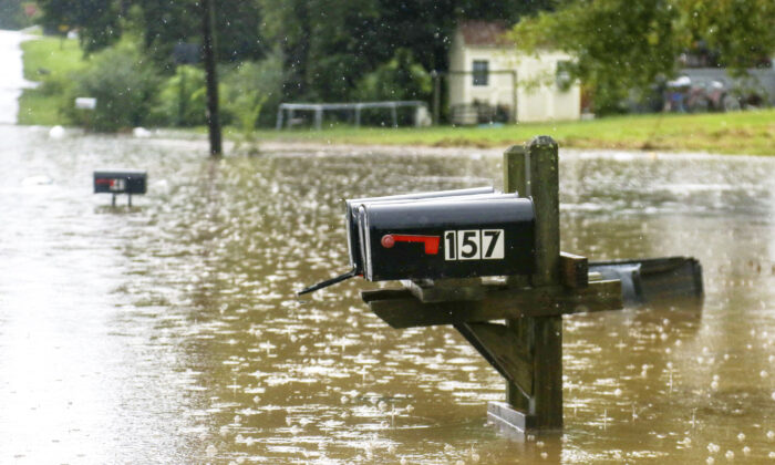 Bittings Avenue is partially underwater in Summerville, Ga., on Sept. 4, 2022. (Olivia Ross/Chattanooga Times Free Press via AP)