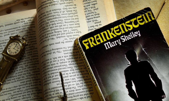 The book “Frankenstein” from Mary Shelley is seen next to other books and notebooks, in Bari, Italy, Nov. 14, 2020. (Claudia Longo/Shutterstock)