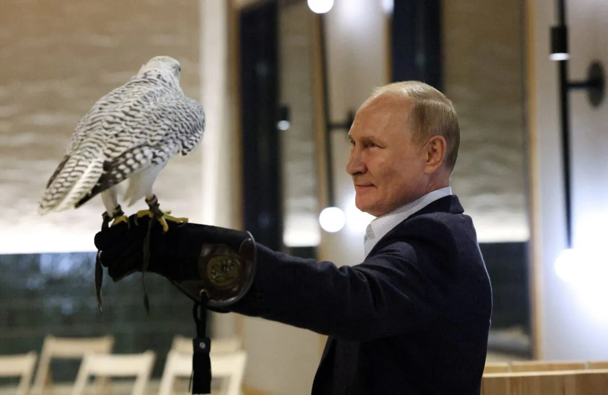 Russian President Vladimir Putin attends a meeting with ornithologists and members of the Kamchatka falcon breeding center in the region of Kamchatka, Russia, on Sept. 5, 2022. (Sputnik/Gavriil Grigorov/Pool via Reuters)
