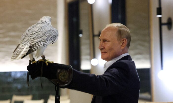 Russian President Vladimir Putin attends a meeting with ornithologists and members of the Kamchatka falcon breeding center in the region of Kamchatka, Russia, on Sept. 5, 2022. (Sputnik/Gavriil Grigorov/Pool via Reuters)