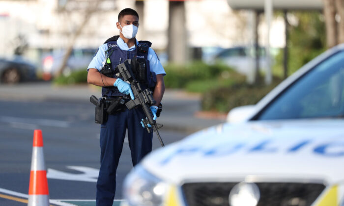 Armed police patrol the area around Countdown LynnMall after a mass stabbing incident in Auckland, New Zealand, on Sept. 3, 2021. (Fiona Goodall/Getty Images)