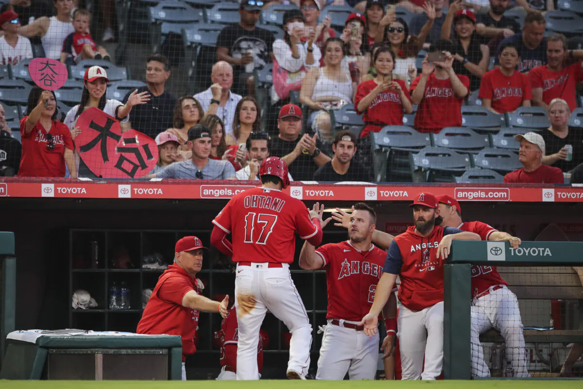 Shohei Ohtani (17) of the Los Angeles Angels celebrates scoring a run in the first inning against the Detroit Tigers at Angel Stadium in Anaheim, Calif., on Sept. 5, 2022. (Meg Oliphant/Getty Images)