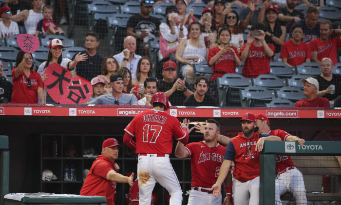 Shohei Ohtani (17) of the Los Angeles Angels celebrates scoring a run in the first inning against the Detroit Tigers at Angel Stadium in Anaheim, Calif., on Sept. 5, 2022. (Meg Oliphant/Getty Images)
