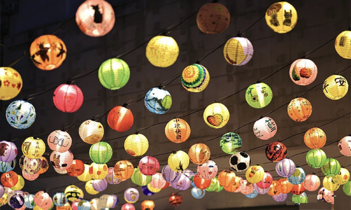 Hundreds of lanterns hand-painted by the community and the public are hung in the Blue House Cluster, on Sept. 3, 2022. (T M Chan/The Epoch Times)