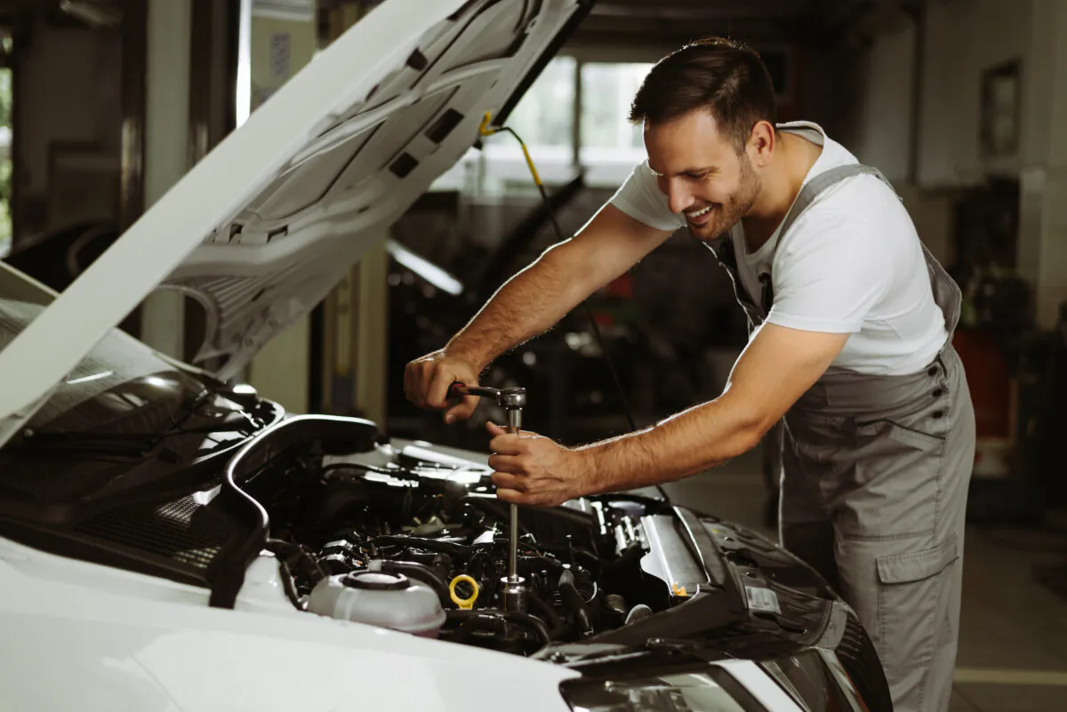 The best-paid side hustle in Canada is working as a mechanic, which can earn you an extra $35 per hour. (goksi/Shutterstock)