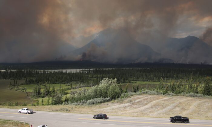 Thick smoke from the Chetamon Mountain wildfire near Jasper, Alberta, drifts across the region on Sept. 4, 2022. (Parks Canada)