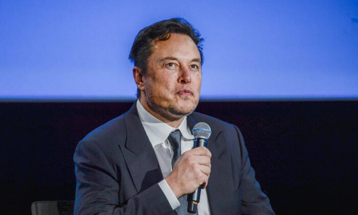 Tesla CEO Elon Musk looks up as he addresses guests at the Offshore Northern Seas 2022 (ONS) meeting in Stavanger, Norway, on Aug. 29, 2022. Norway OUT. (Carina Johansen/NTB/AFP via Getty Images)