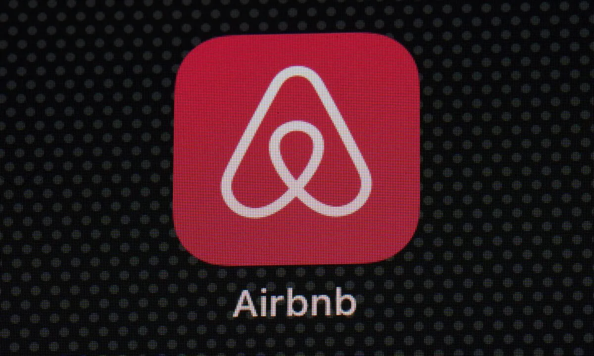 The Airbnb app icon is displayed on an iPad screen in Washington on May 8, 2021. (Patrick Semansky/AP Photo)