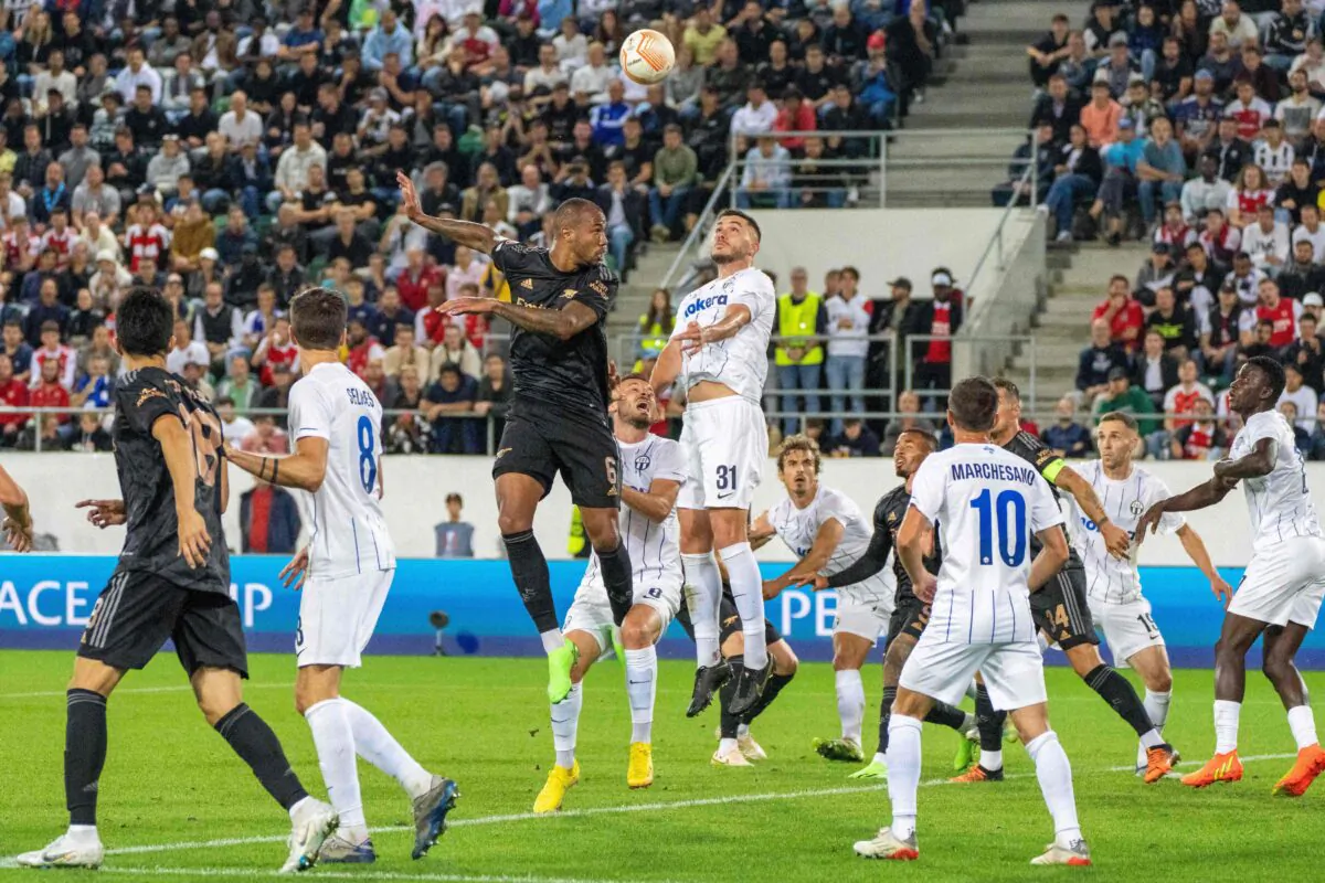 Arsenal's Brazilian defender Gabriel Magalhaes (C-L) and Zurich's Kosovan defender Mirlind Kryeziu (C-R) jump for the ball during the UEFA Europa League Group A first leg football match between FC Zurich and Arsenal FC at Kybun Park stadium in St. Gallen, on Sept. 8, 2022. (Urs Bucher/AFP via Getty Images)