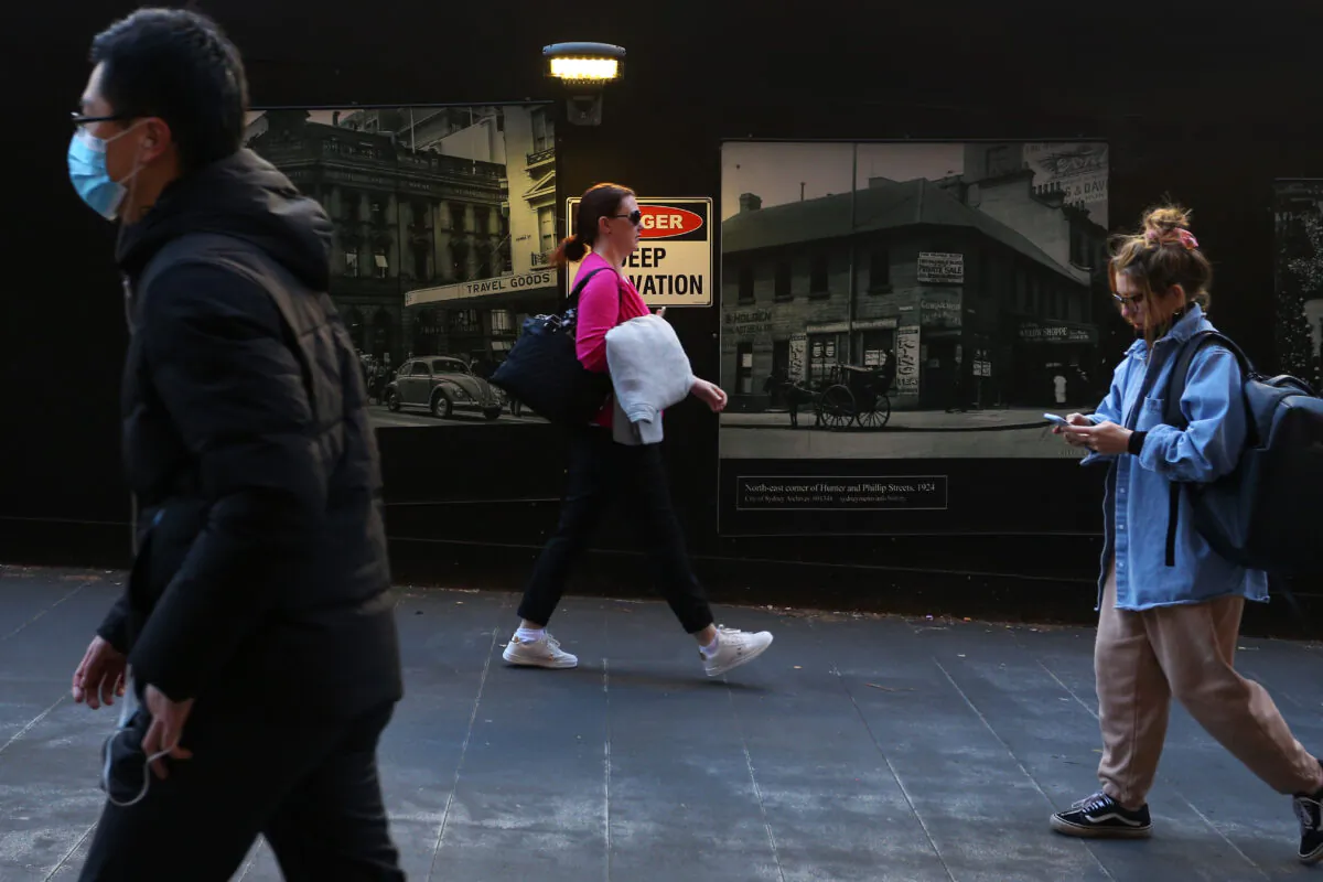 Pedestrians move through Martin Place in Sydney, Australia, on Aug. 16, 2022. (Lisa Maree Williams/Getty Images)