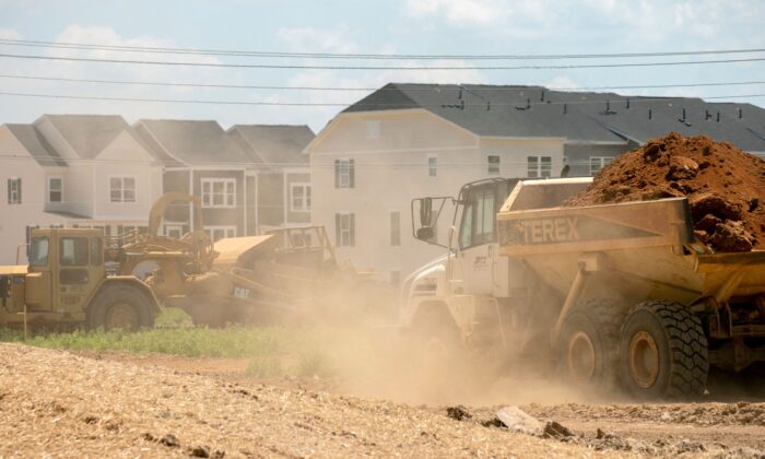 New homes are seen past construction vehicles in Laurel, Maryland, on June 4, 2022. (Stefani Reynolds/AFP via Getty Images)