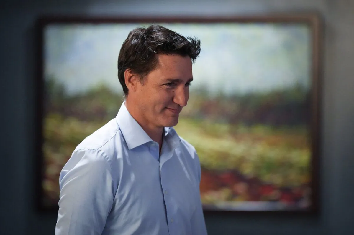 Prime Minister Justin Trudeau walks back to the meeting room after a break during the second day of a Liberal cabinet retreat in Vancouver on Sept. 7, 2022. (The Canadian Press/Darryl Dyck)