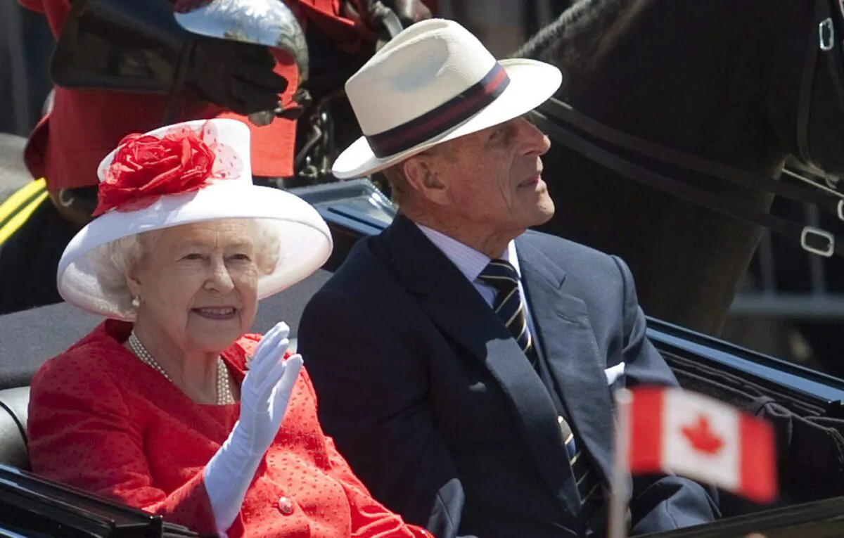 Queen Elizabeth and the Duke of Edinburgh arrive for Canada Day celebrations on Parliament Hill in Ottawa on Canada Day July 1, 2010. (The Canadian Press /Pawel Dwulit)