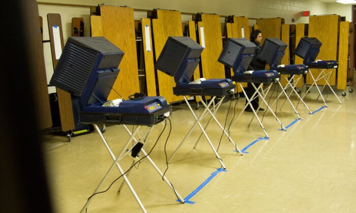 Voters cast ballots in Manassas, Va., in a file image. (Karen Bleier/AFP via Getty Images)