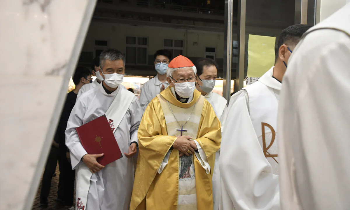 Cardinal Joseph Zen (C), Bishop Emeritus of the Catholic Diocese of Hong Kong, was arrested by the National Security Department of the Hong Kong Police Force for suspected irregularities while trustee of the 612 Humanitarian Relief Fund. (Big Mack/The Epoch Times)