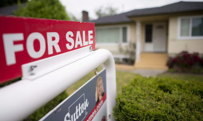 A real estate sign is pictured in Vancouver, B.C., on June, 12, 2018. (The Canadian Press/Jonathan Hayward)