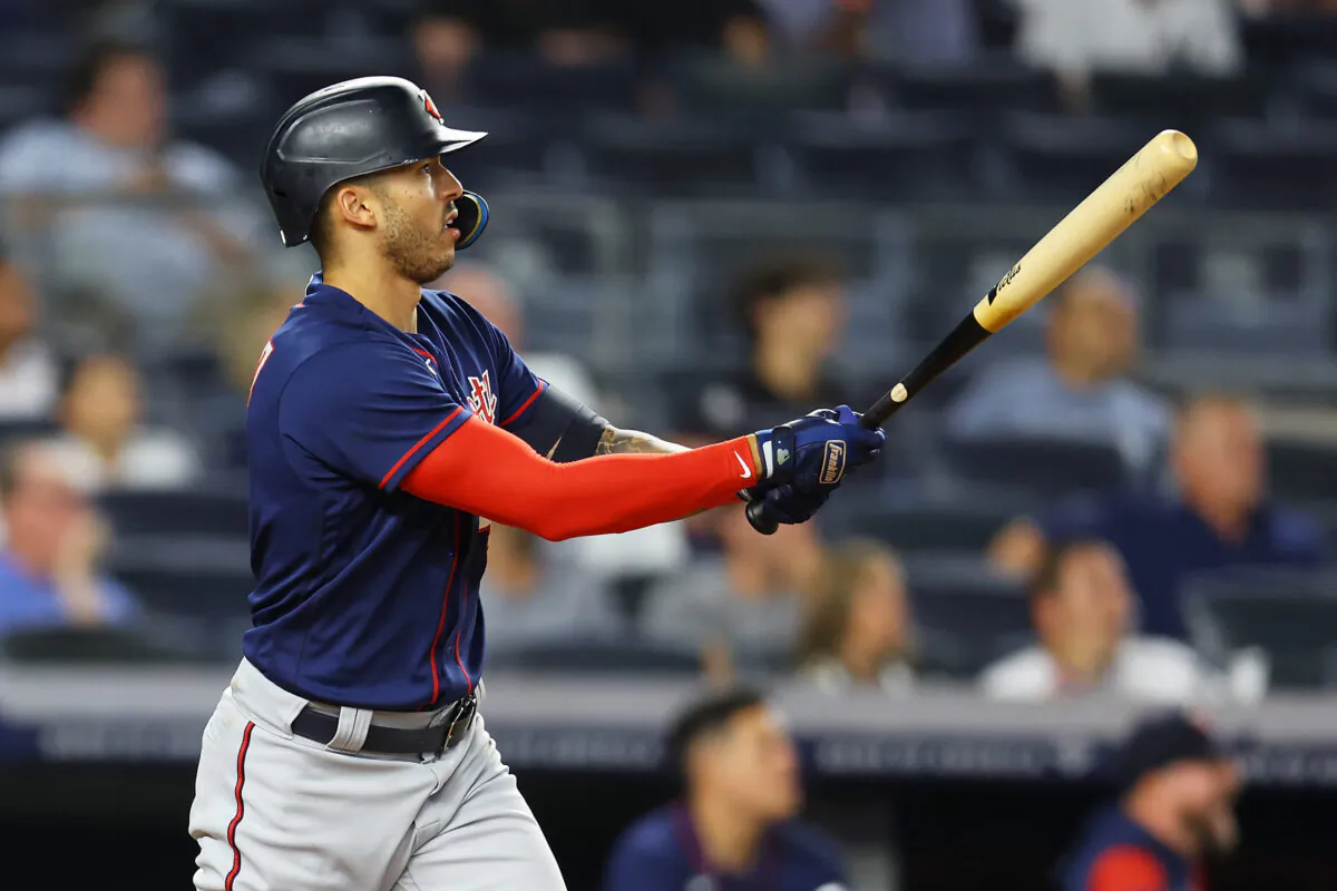 Carlos Correa (4) of the Minnesota Twins hits a 2-run home run to left field in the eighth inning against the New York Yankees at Yankee Stadium in the Bronx borough of New York on Sept. 8, 2022. (Mike Stobe/Getty Images)