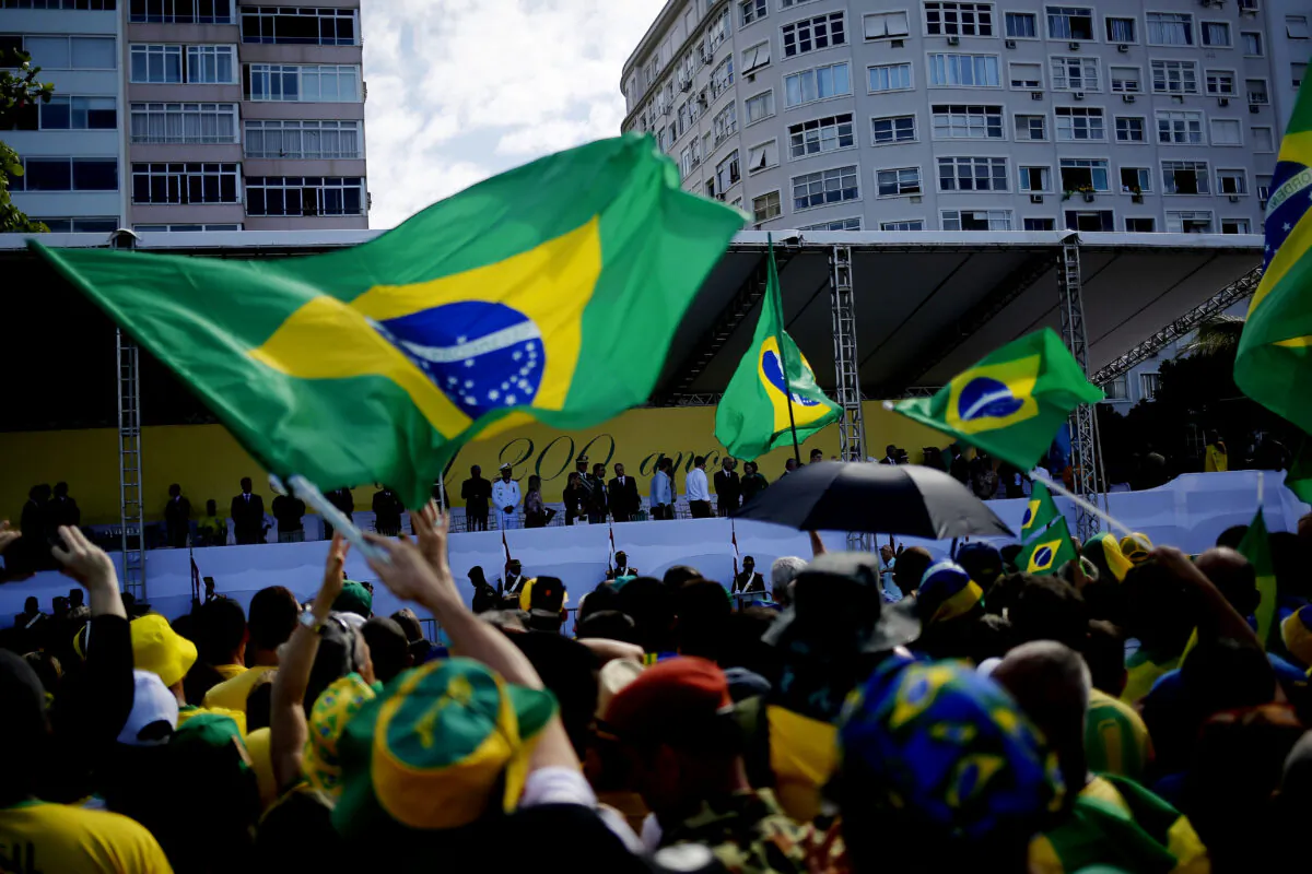Incumbent Brazil President Jair Bolsonaro talks to supporters during a campaign rally and military display on Brazil's 200th Independence day at Copacabana Beach in Rio de Janeiro, on Sept. 7, 2022. (Wagner Meier/Getty Images)